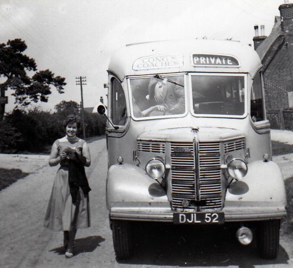 Christine waits by the bus